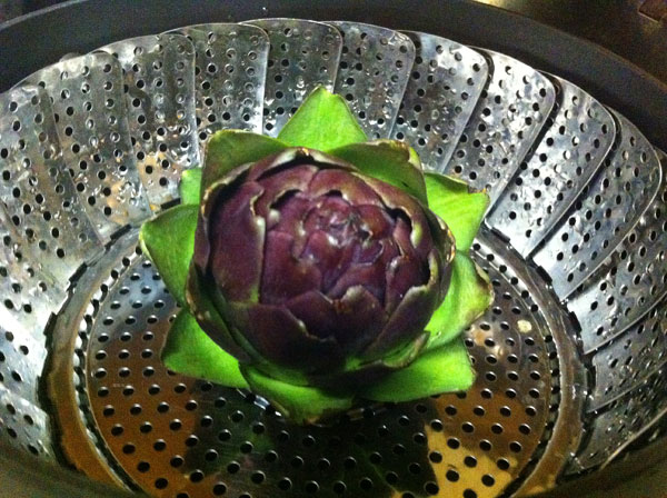 Cook artichoke whole
